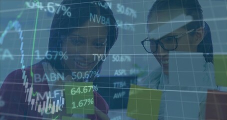 Financial analysts wearing business attire studying stocks on tablet in office, with ticker overlay