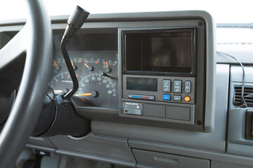 1990s full size American 4x4 SUV with 5.7L V8 interior dashboard and instrument cluster, showing analog gauges, odometer, climate controls, switches, and classic design details