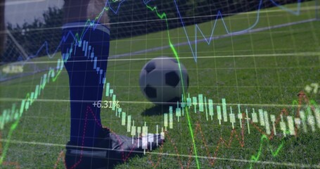 Positioning leg with blue sock and black cleat behind soccer ball on pitch, with data overlay