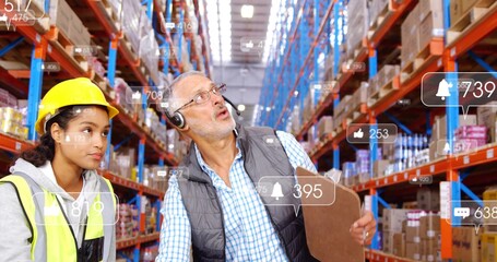 Warehouse staff wearing hard hats and vests scanning boxes in aisle, with clipboard and icons