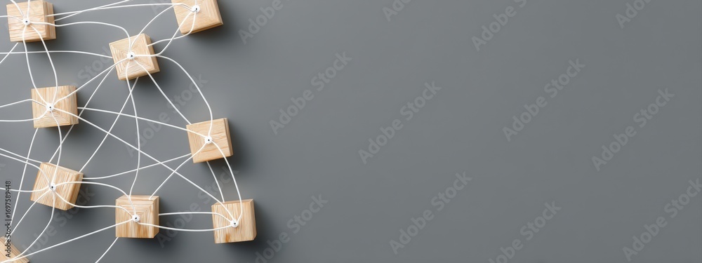Poster interconnected wooden cubes on a gray background represent a complex network, symbolizing concepts s