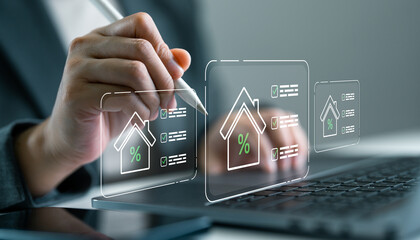 Businessperson using digital to manage housing loan interest rates. Mortgage calculation, real estate finance, online loan application and financial technology concept. Paperless lending system.