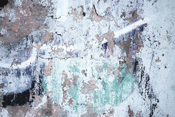 Rustic textured wall with peeling paint in faded blue, brown, purple. Vintage 80s, retro vibe, distressed grunge look. Background, texture, abstract art, modern 90s, digital design.