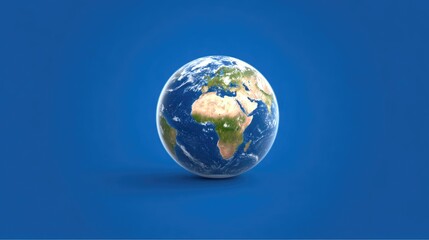Earth globe on a plain blue background