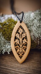 Wooden floral pendant on black cord