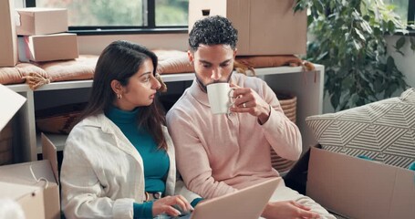 Couple, laptop and planning in new home with boxes, coffee or search for furniture with online shopping. People, computer and moving with real estate, ecommerce or point for interior design at house - Powered by Adobe