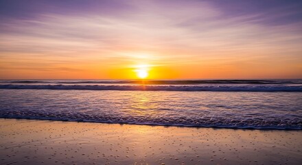 Obraz premium Serene ocean sunset with gentle waves lapping at the sandy shore, casting a warm, golden glow across the tranquil water