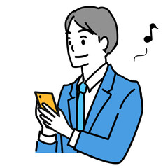 スマホを見て喜ぶ若いビジネスマン