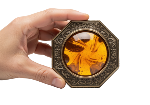 Subtly aged human hand gently holds an intricate octagonal device with tarnished dark bronze frame, glowing swirling amber lens, on a transparent background. Concept of ancient artifact and forgotten