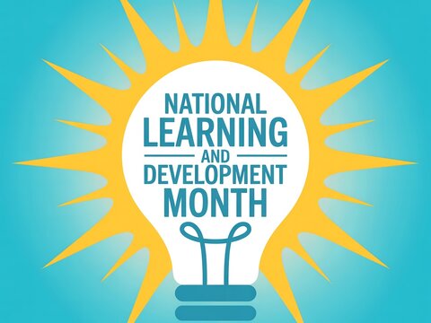 National learning and development month lightbulb on blue background