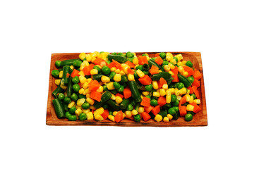 Mixed vegetables on a wooden plate, isolated on white background 