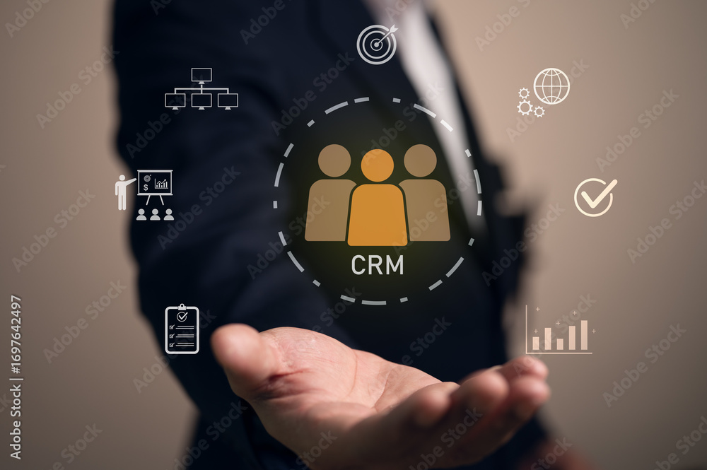 Poster a businessman holds a virtual interface with a central crm icon for managing client data, workflow, 