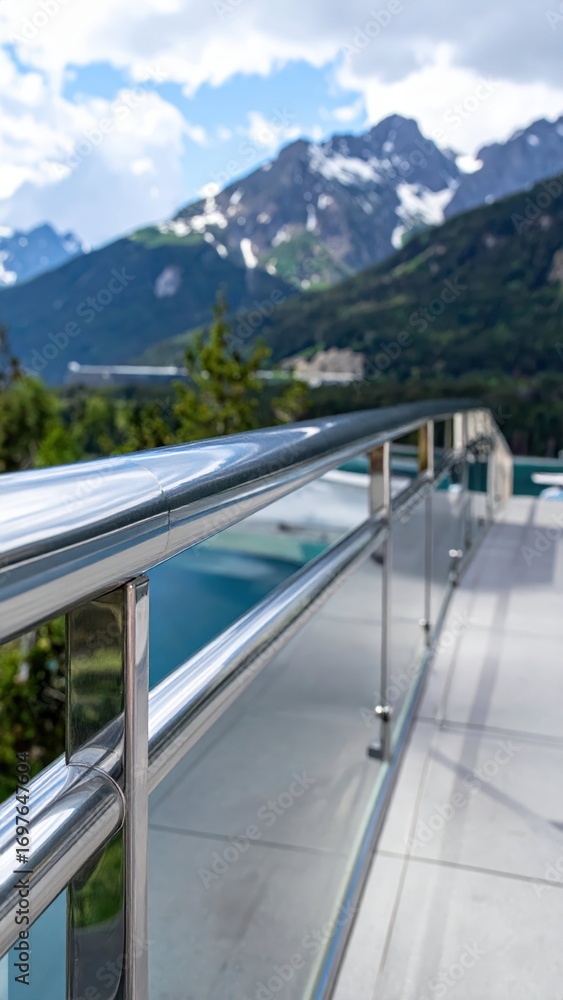 Poster modern railing design with scenic mountain view in the background
