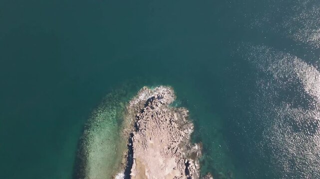 Basalt Columns of Bruce Cape. Aerial view of the basalt columns of Bruce Cape rising above the turquoise waters of the Sea of Japan in Primorsky Krai.