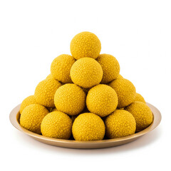 Front view of Besan Ladoo sweets arranged in a neat mountain circle on brass plate isolated on white background
