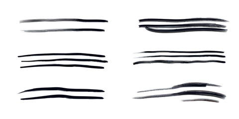 Set of black hand drawn brush stroke lines with different thicknesses and styles for underline, highlight, and accent design elements in minimalist vector format