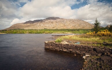 Beautiful landscape scenery with lake and mountains at Derryclare natural reserve Connemara Ireland