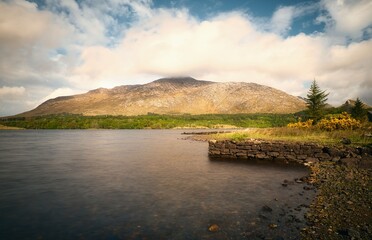 Beautiful landscape scenery with lake and mountains at Derryclare natural reserve Connemara Ireland