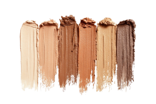 Swatch strokes of various foundation shades, displayed vertically against a transparent background
