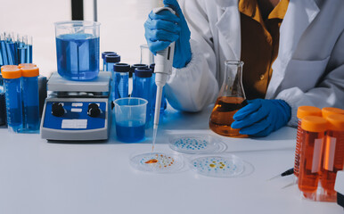 Collaboration, tablet or science with people in lab together for research or development....