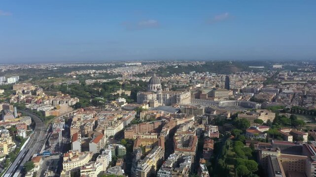 Aerial flying towards St. Peter&rsquo;s Basilica, its majestic dome, and the vast Piazza San Pietro, symbolizing the heart of the Catholic Church and Rome&rsquo;s timeless beauty.