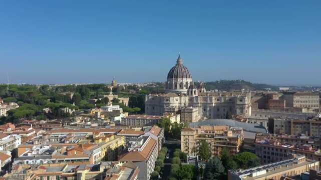 Aerial rising above St. Peter&rsquo;s Basilica, and revealing its majestic dome, and the vast Piazza San Pietro, symbolizing the heart of the Catholic Church and Rome&rsquo;s timeless beauty.