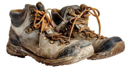 Pair of worn hiking boots, laces untied, hinting at a recent trek, isolated on Transparent background,