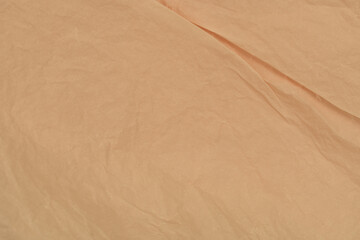 Naklejka premium Beige Crumpled Kraft Paper Texture Background