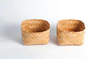 Besek isolated on white background, bamboo basket for storing pieces of goat meat, beef, and snacks