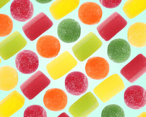 Pattern of sweet jelly candies on light blue background