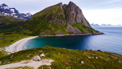 Scenic coastal landscape with a sandy beach and mountains
