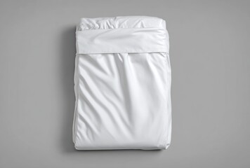A folded, white bedding set is centered on a neutral gray background. The fabric has subtle wrinkles and shadows, creating a soft, inviting texture