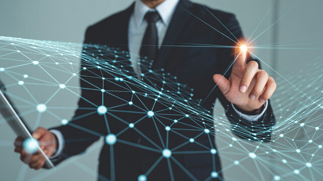 Businessman touching digital network technology interface for global business solutions