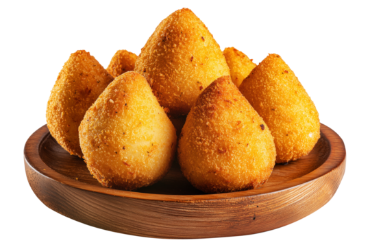 Crispy Brazil coxinha snack filled with shredded chicken croquettes and creamy cheese on wooden plate, isolated on white transparent background, concept of South American Cuisine