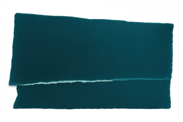 Torn piece of dark turquoise paper with transparent background creating negative space for easy placement in designs