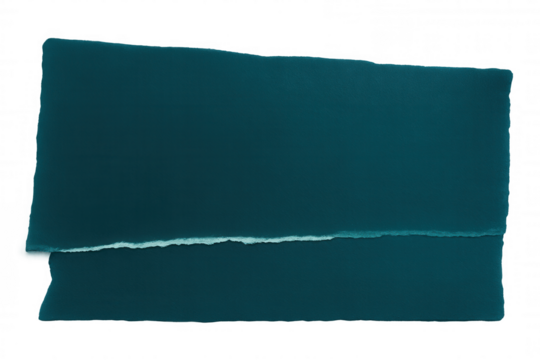 Torn piece of dark turquoise paper with transparent background creating negative space for easy placement in designs