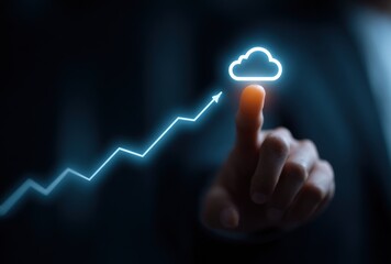 Digital growth concept A hand touches a glowing cloud icon atop a rising arrow, set against a dark background, symbolizing innovation and advancement