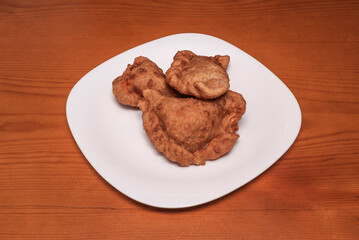 Cauliflower and turmeric empanadas, baked with chickpea dough