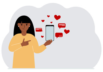 A woman with a smartphone in his hand. The concept of correspondence, communication, social networks. Lots of hearts.