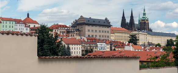 Prague Castle and St. Vitus Cathedral photographed from a unique angle, space for text.