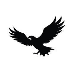 Fototapeta premium Majestic black silhouette of an eagle in full flight with wings spread wide