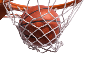 Close-up of basketball sinking through net