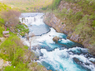 Strbački buk, 24.5 m high, is the highest and most spectacular waterfall in the National Park and its origin is due to tectonic movements and the formation of travertine deposits.