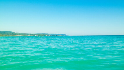 Obraz premium Blue water of Tyrrhenian sea in Vada, Tuscany, Italy.