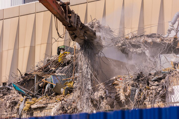 Construction of buildings and high-rise cranes against the sky and city street © Kozlik_mozlik
