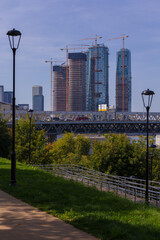 Obraz premium Construction of high-rise buildings, general views of buildings and cranes