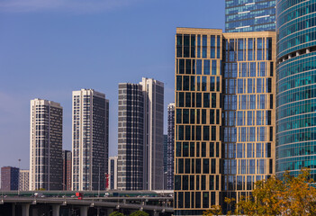 High-rise buildings and skyscrapers on a sunny summer day.