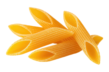 Close-up of uncooked penne pasta.  Several tubes of golden pasta overlap, showing a ridged surface and hollow center