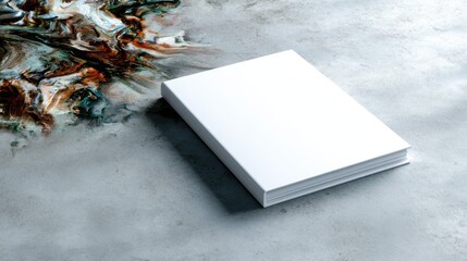 An unmarked white book lies flat against a stylized background, inviting creativity and imagination while symbolizing the potential for stories yet untold.