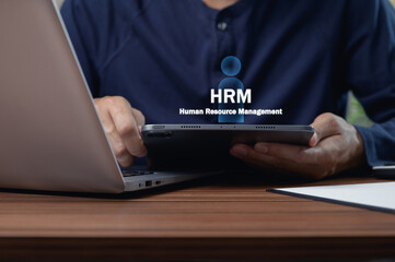 Focused Person Engaging With Tablet for Human Resource Management